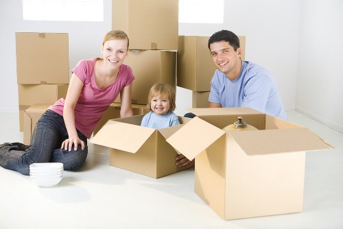Removal van and moving team serving a Tufnell Park street