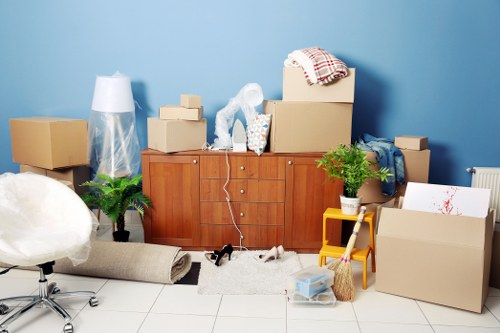 Moving team using PPE and protecting property during a move