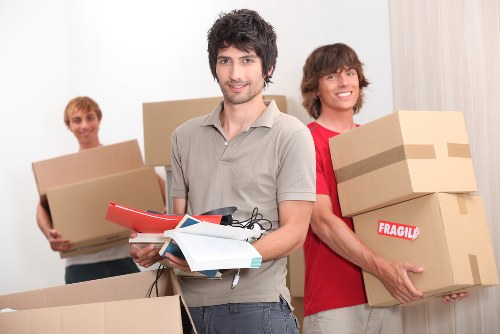 Removals team handling a move in Tufnell Park street