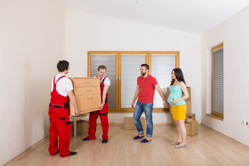 Team preparing furniture and boxes for removal truck hire
