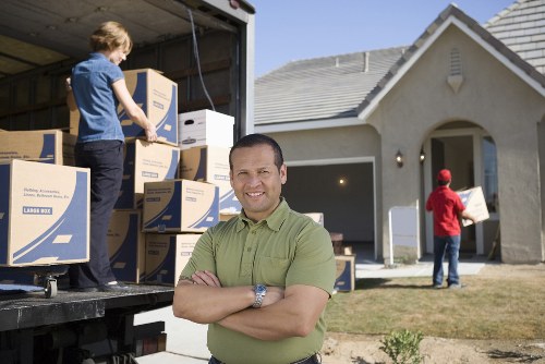 Packed boxes and furniture ready for a local house move