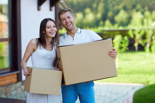 Professional movers loading items for a house removal in Tufnell Park