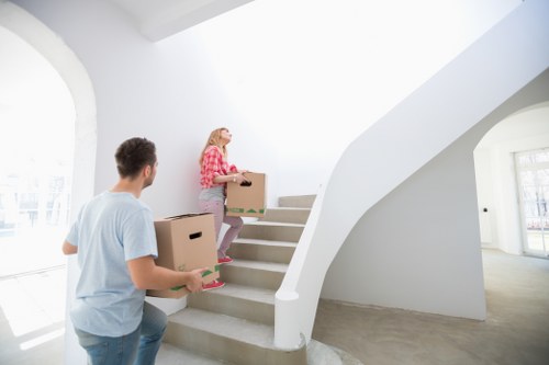 Packed boxes and furniture ready for local removal service