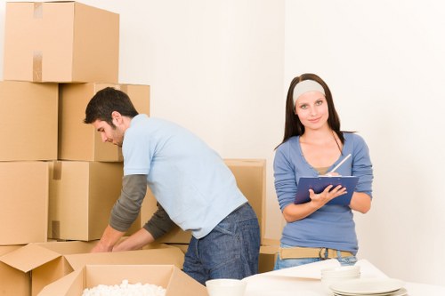Careful furniture loading for a local house move in North London