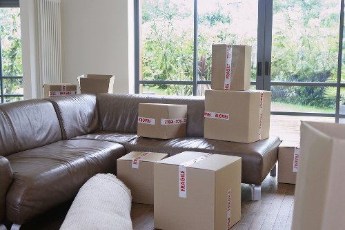 Careful loading of boxes and furniture into a van for a house move